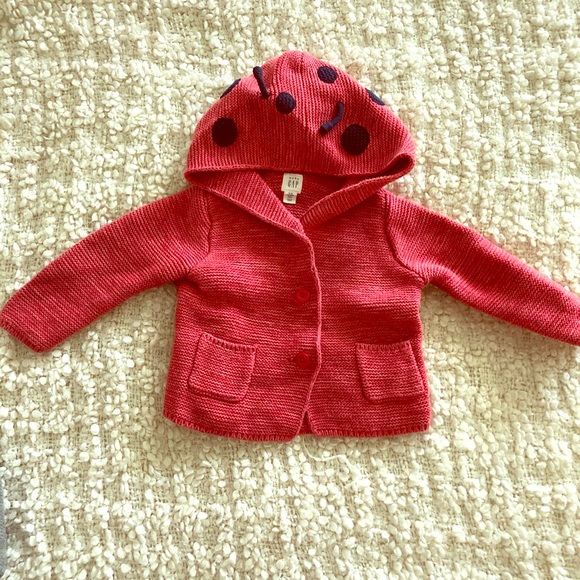 SALE ITEM A single Baby Hoodie with front zip in Fuchsia Pink size 6-12 Months